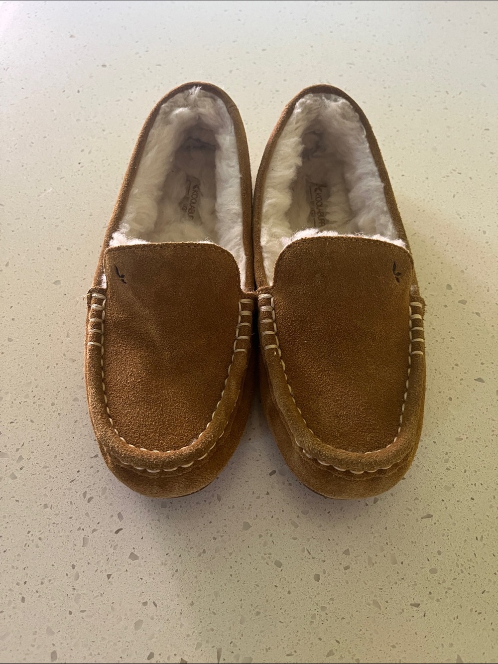 Kookaburra by Ugg suede moccasin with shearling lining.